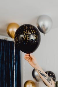 a person holding a balloon